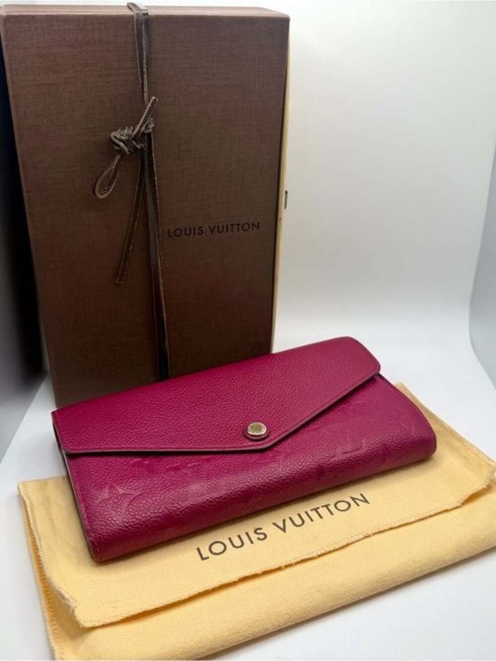 Louis Vuitton Monogram Empreinte Sarah Long Wallet Fuchsia